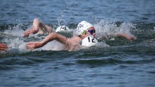 Tom and Kitty Strike Gold in Open Water Competition Tom and Kitty Strike Gold in Open Water Competition